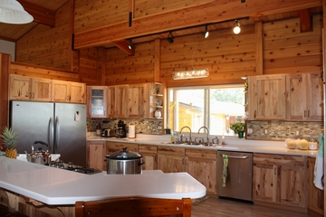Custom remote home by Mauna Loa Cedar Homes